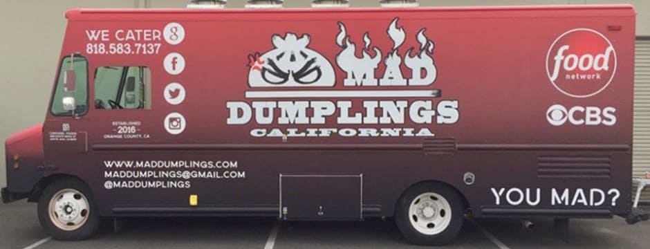 A food truck with the words mad dumblings california.