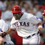 A texas rangers baseball player celebrates a home run.