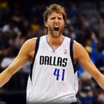 The dallas mavericks player is shouting during a game.