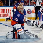 The new york islanders goaltender is ready to make a save.